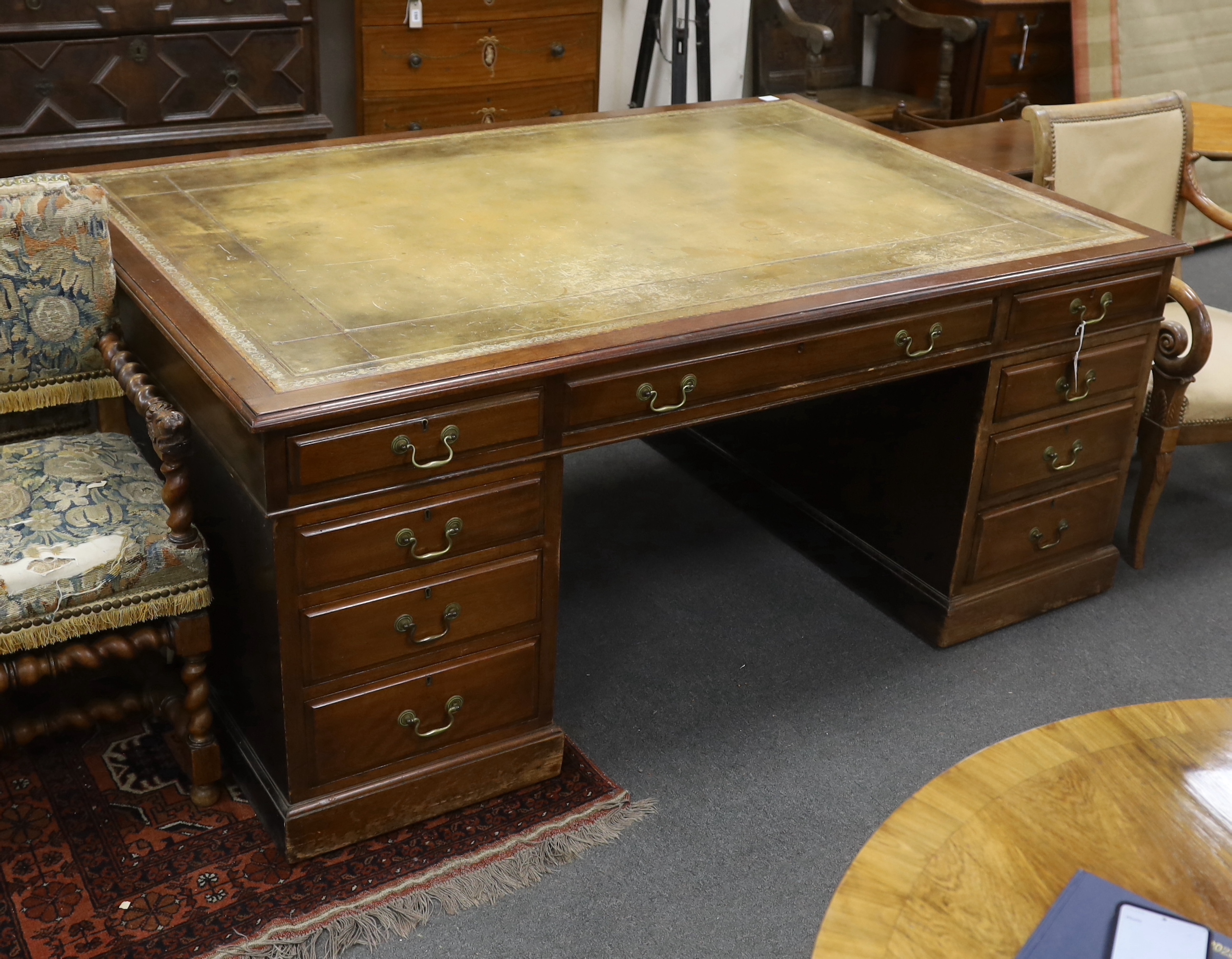 An early 20th century mahogany pedestal partner's desk, length 184cm, depth 120cm, height 77cm